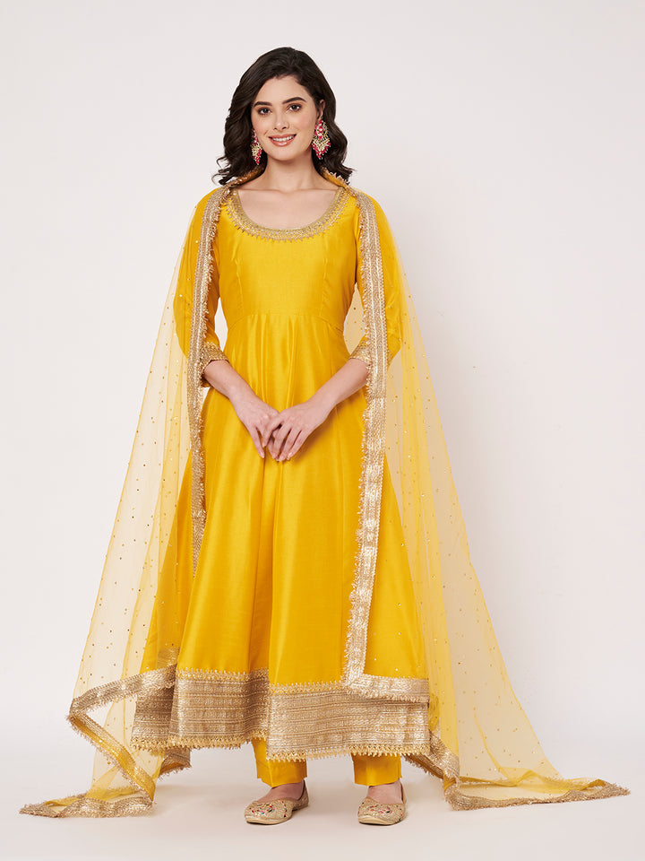 anokherang Combos Radiant Mustard Silk Anarkali with Pants and Bridal Net Embellished Dupatta