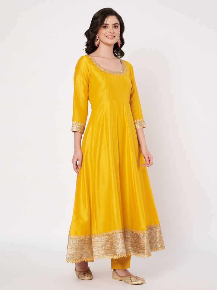 anokherang Combos Radiant Mustard Silk Anarkali with Pants and Bridal Net Embellished Dupatta