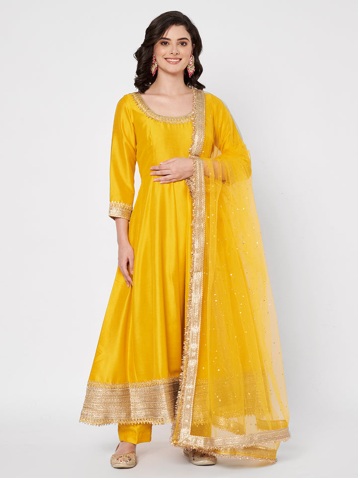 anokherang Combos Radiant Mustard Silk Anarkali with Pants and Bridal Net Embellished Dupatta