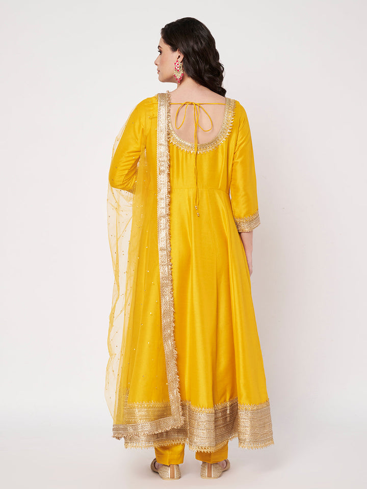 anokherang Combos Radiant Mustard Silk Anarkali with Pants and Bridal Net Embellished Dupatta