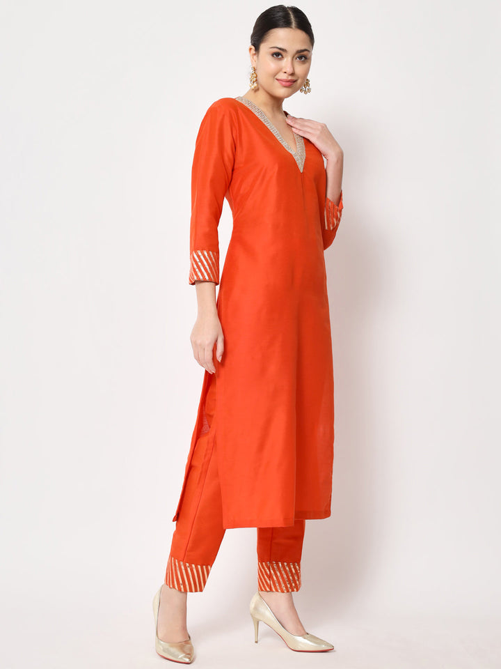 anokherang Combos Glorious Orange Lines Kurti with Straight Pants