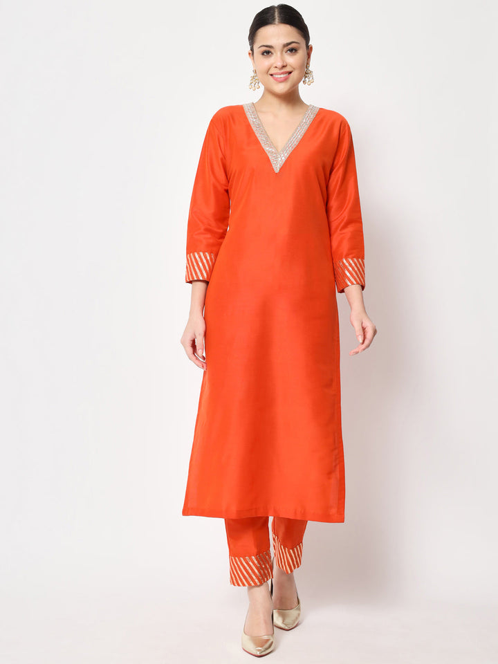 anokherang Combos Glorious Orange Lines Kurti with Straight Pants