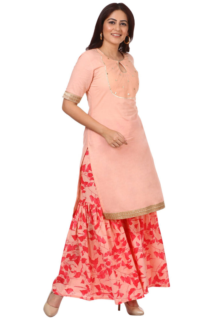 anokherang Combos Peach Peephole Short Kurti with Printed Gharara