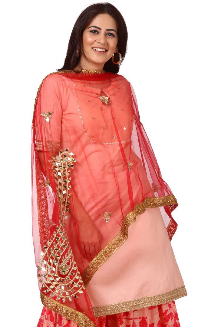 anokherang Combos Peach Peephole Short Kurti with Printed Gharara and Red Net Mirror Paisley Dupatta