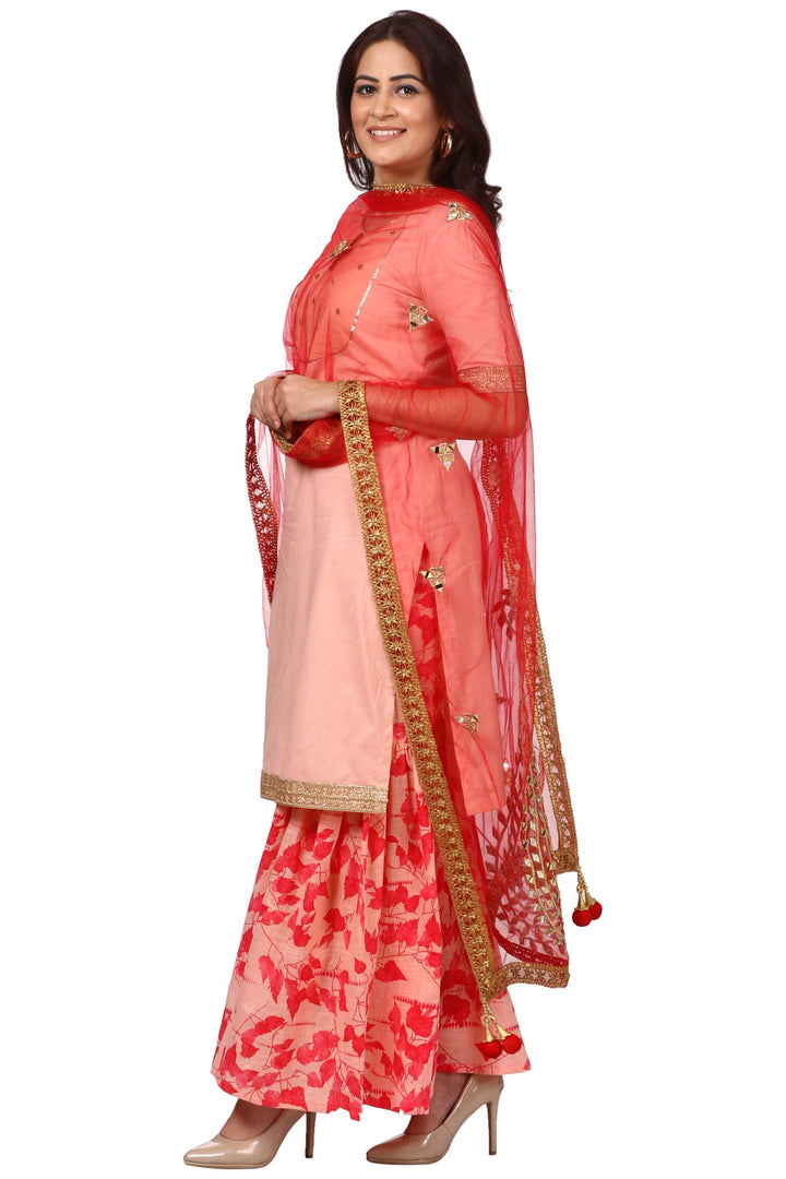 anokherang Combos Peach Peephole Short Kurti with Printed Gharara and Red Net Mirror Paisley Dupatta