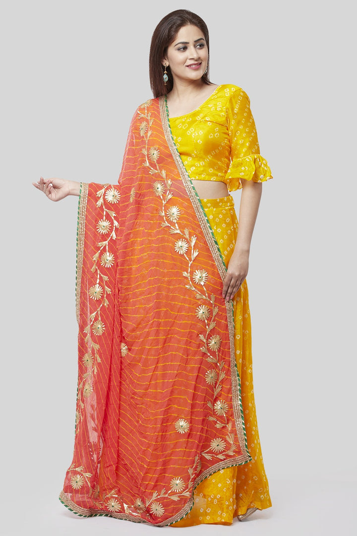 anokherang Lehenga Sunshine Yellow Bandhej Ruffle Lehenga Choli with Peachy Orange Leheriya Dupatta