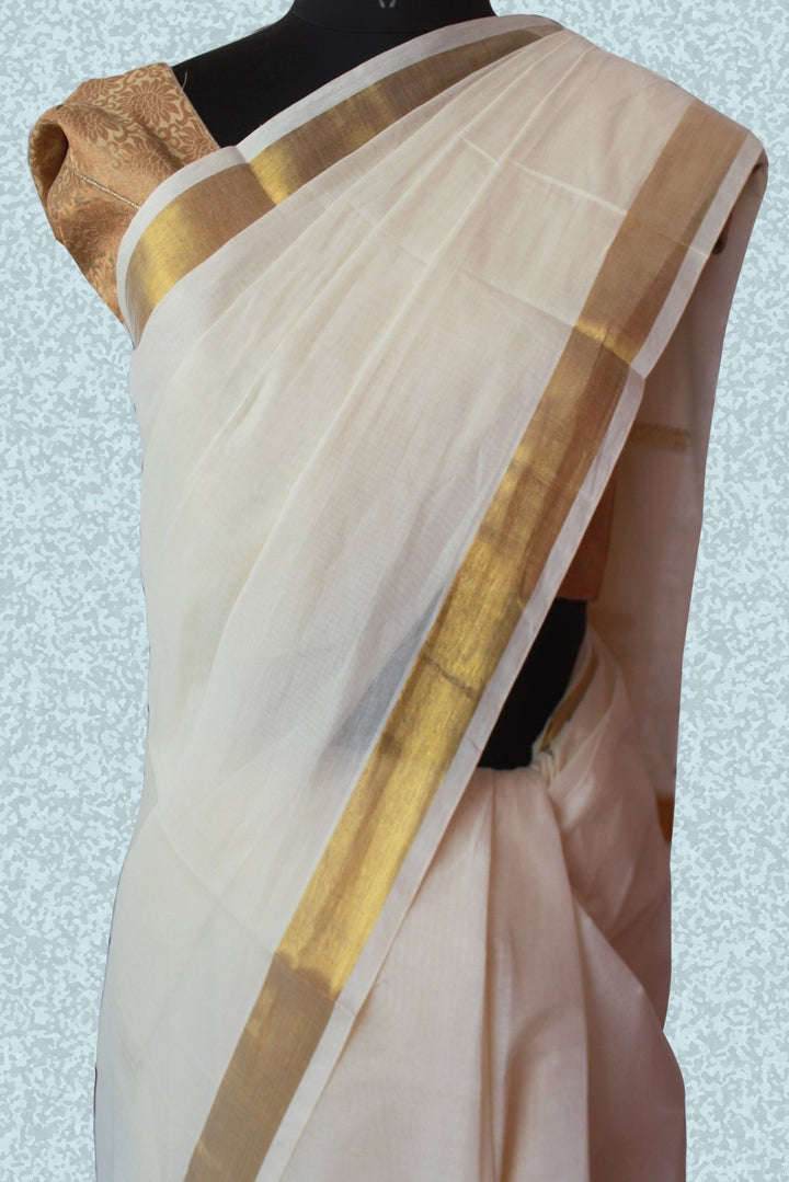 anokherang Sarees Elegant Gold White Saree