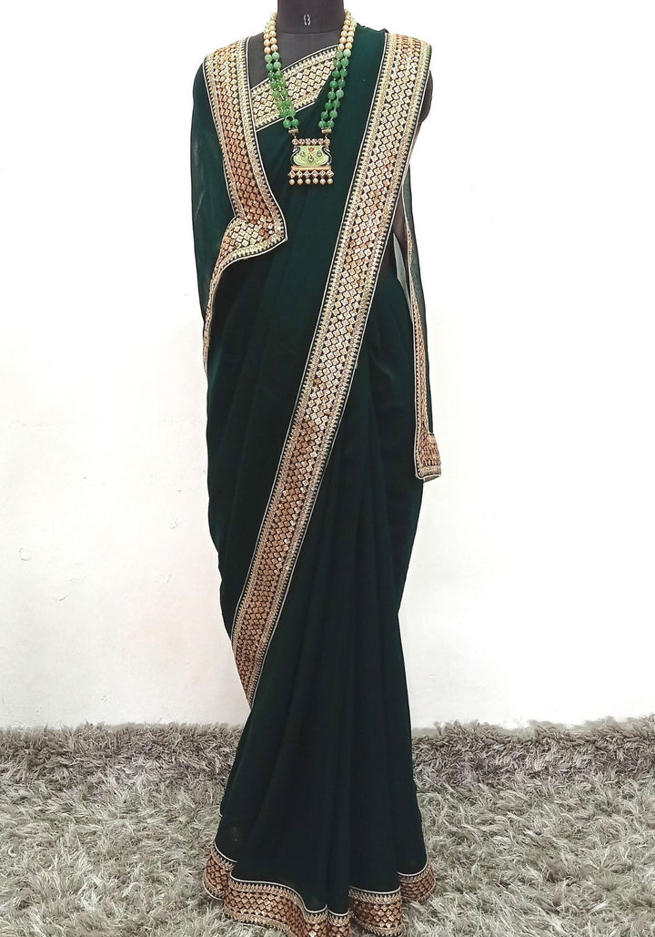 anokherang Sarees Emerald Green Sequin Embroidered Border Georgette Saree