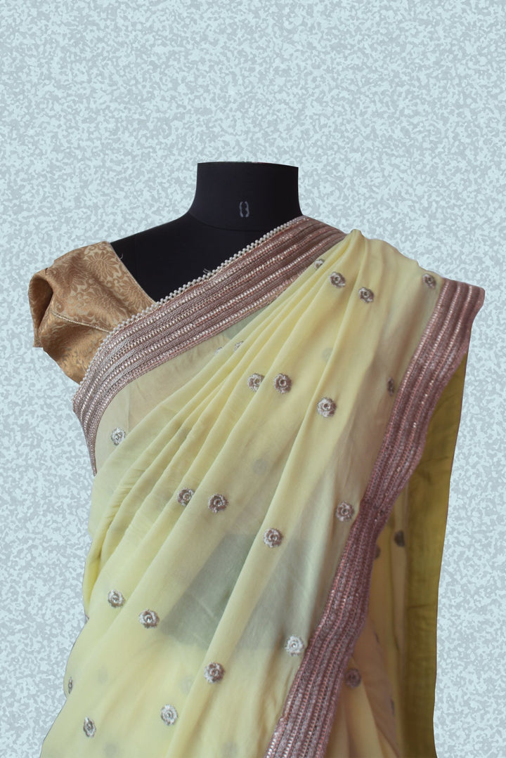 anokherang Sarees Off white yellow embroidered saree