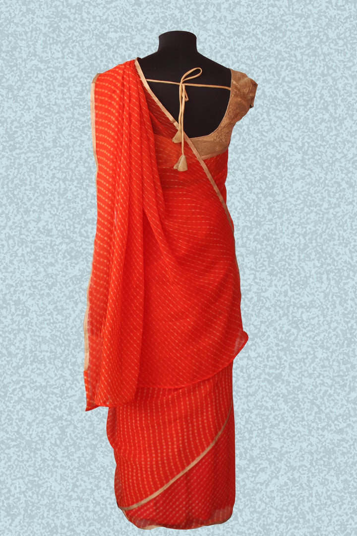 anokherang Sarees Orange blossom leheriya saree