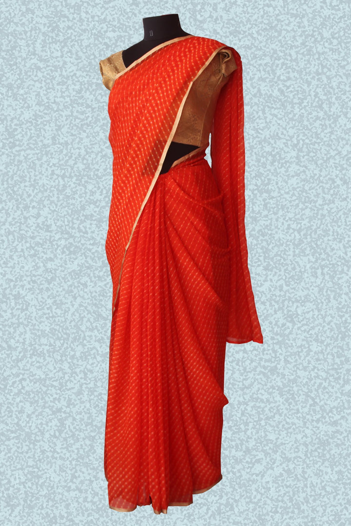 anokherang Sarees Orange blossom leheriya saree
