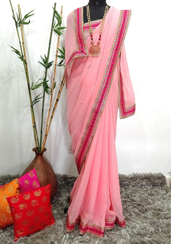 anokherang Sarees Splendid Pink Embroidered Border Georgette Saree