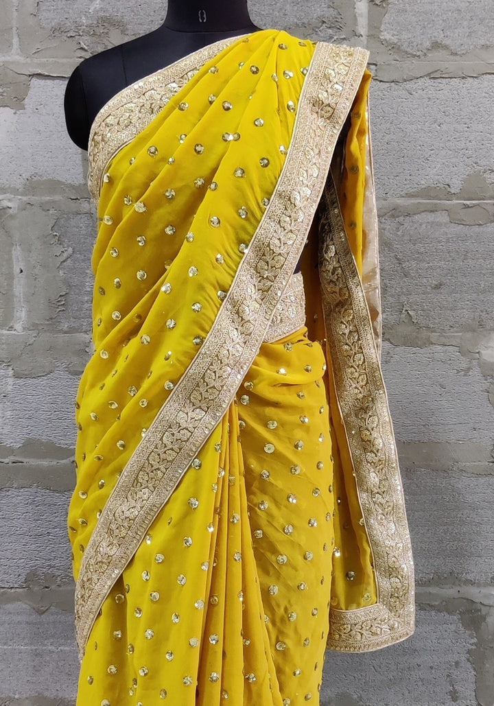 anokherang Sarees Warm Mustard Embroidered Border Georgette Saree