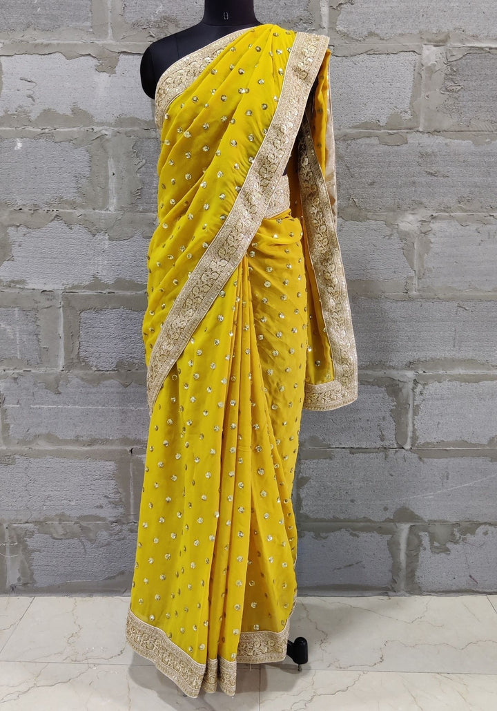anokherang Sarees Warm Mustard Embroidered Border Georgette Saree